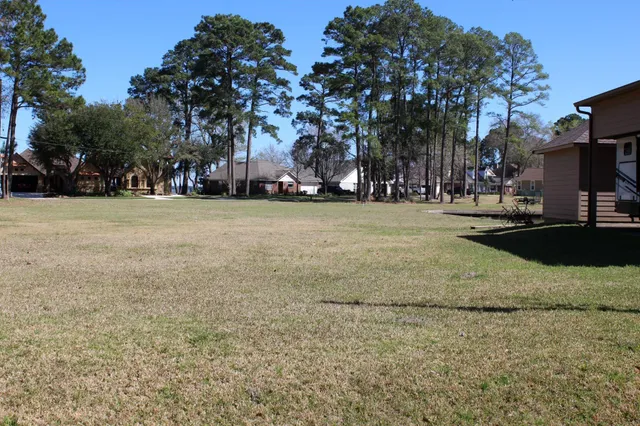 a view of a swimming pool with a garden