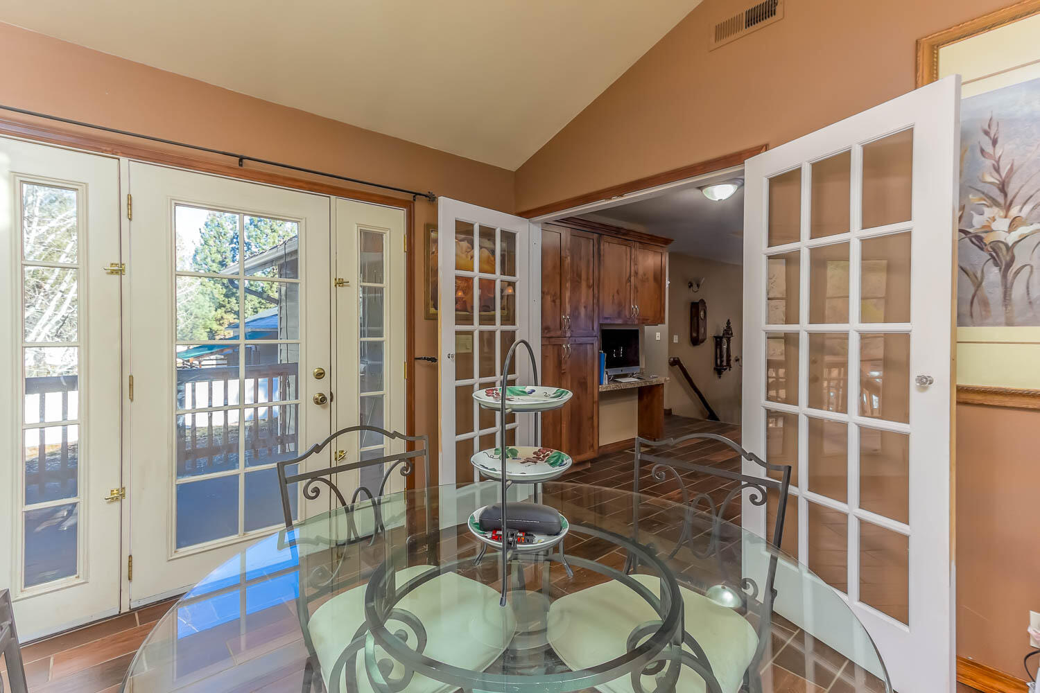 53345 Andrews Road La Pine, OR 97739 - Photo 22 of 42 Upper level dining room with exterior door to deck.