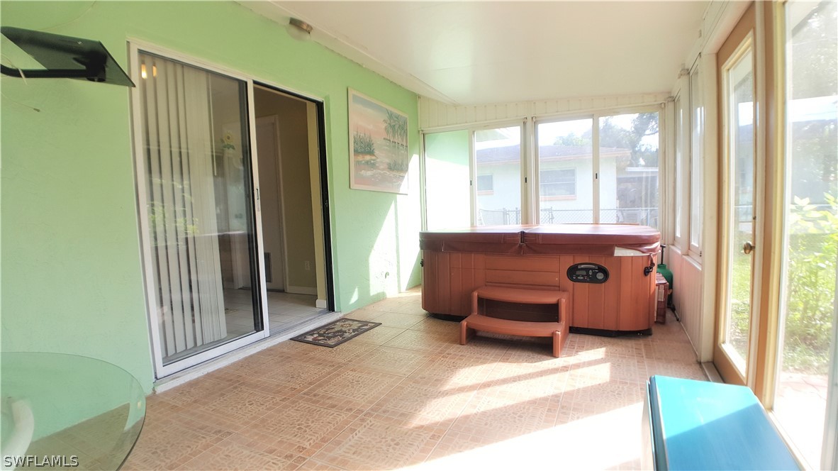 2332 Caladium Road Fort Myers, FL 33905 - Photo 13 of 17 a room with furniture and a window