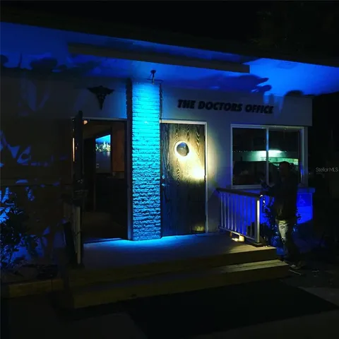 a view of a house with outdoor space and porch