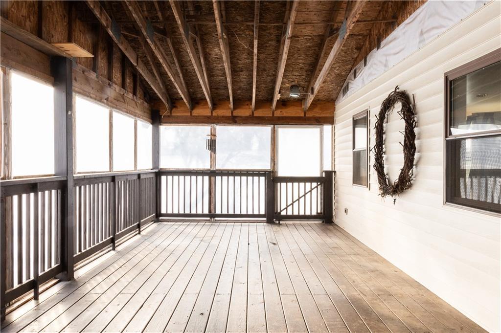 213 Unionville Road Butler, PA 16001 - Photo 3 of 38 a view of balcony with wooden floor