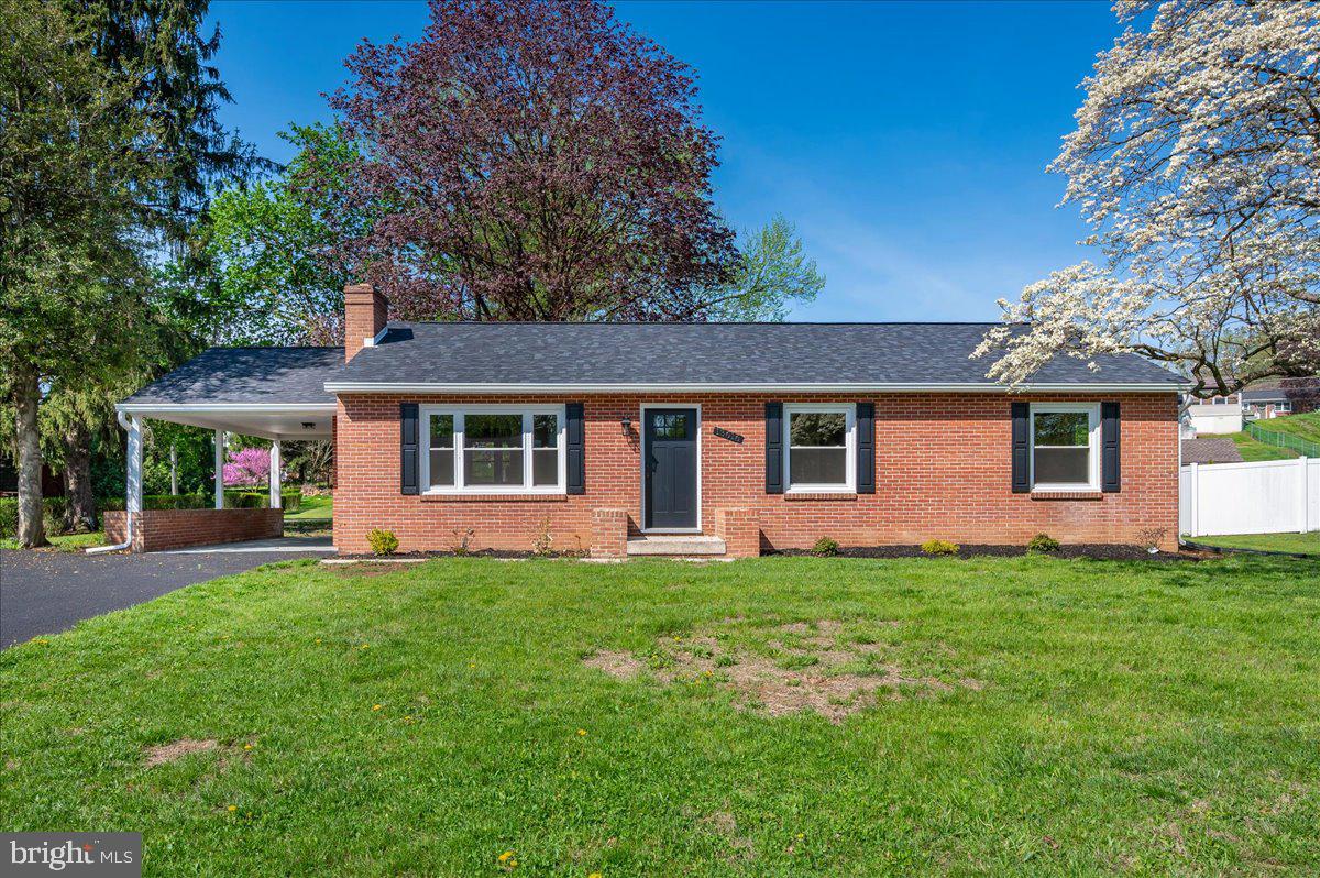 13616 Royal Road Hagerstown, MD 21742 - Photo 2 of 57 Charming brick home with lush greenery.