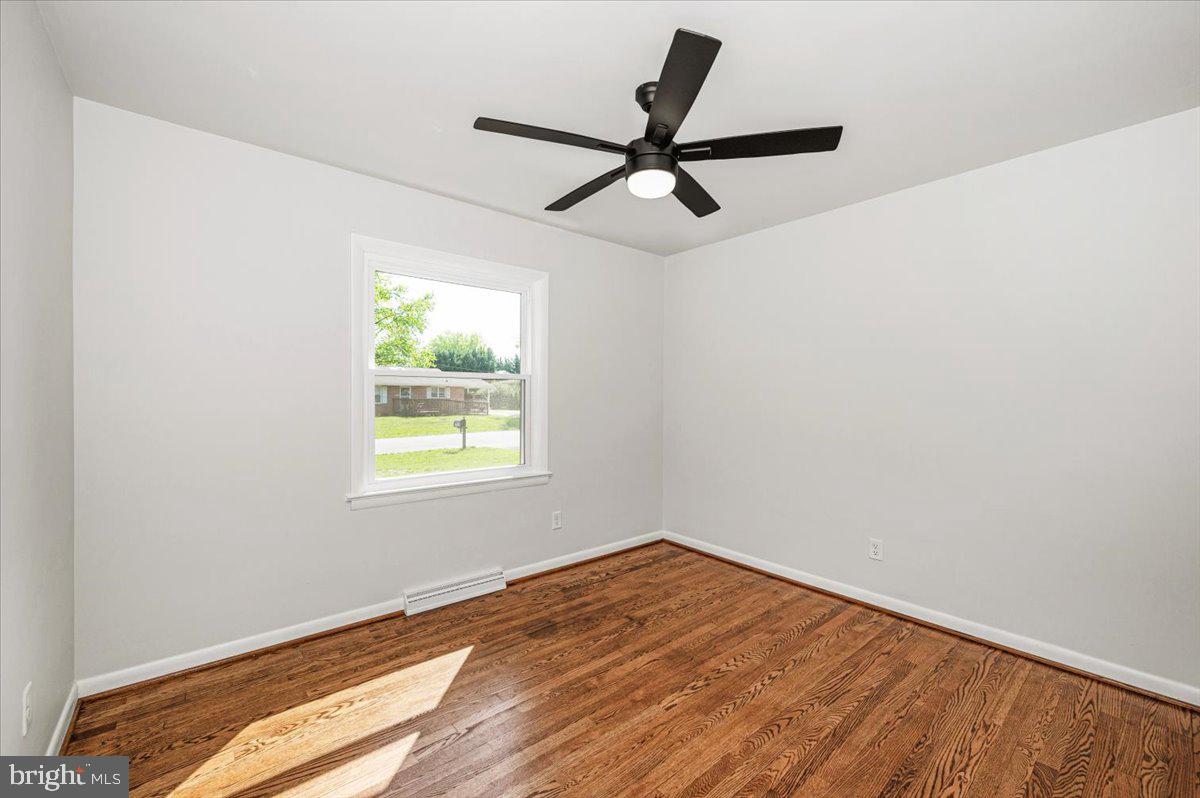 13616 Royal Road Hagerstown, MD 21742 - Photo 22 of 57 Bright and airy room with hardwood floors.
