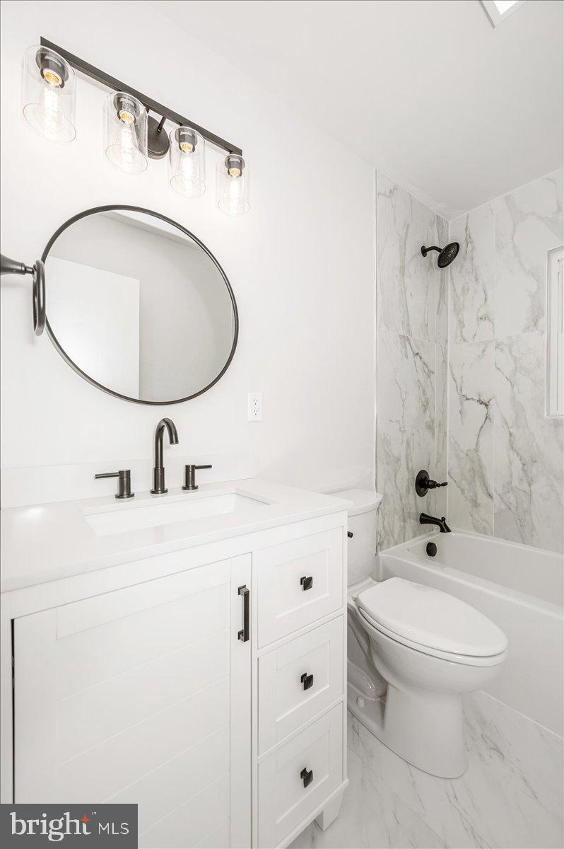 13616 Royal Road Hagerstown, MD 21742 - Photo 25 of 57 Sleek modern bathroom with elegance.