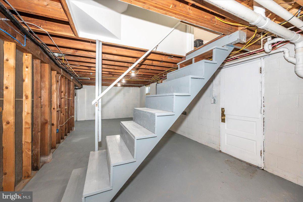 13616 Royal Road Hagerstown, MD 21742 - Photo 33 of 57 Spacious basement with modern stairs.