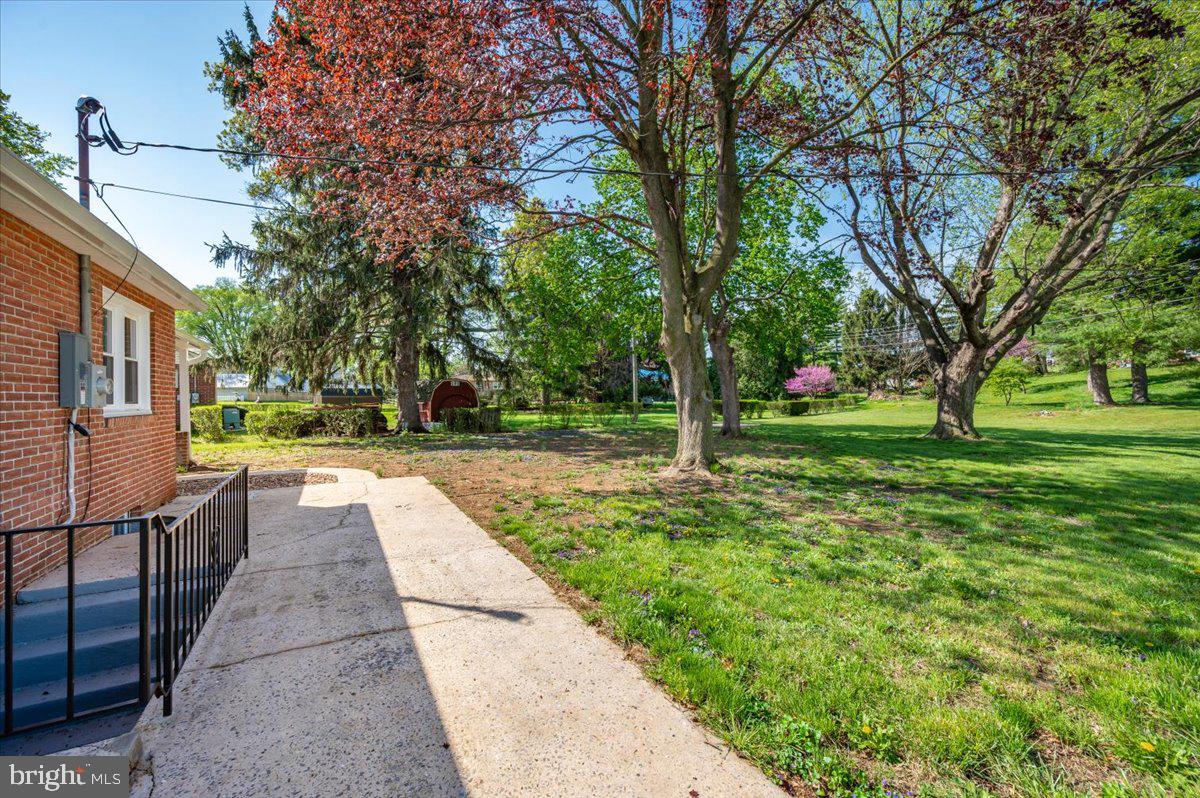 13616 Royal Road Hagerstown, MD 21742 - Photo 42 of 57 Spacious yard with vibrant greenery.