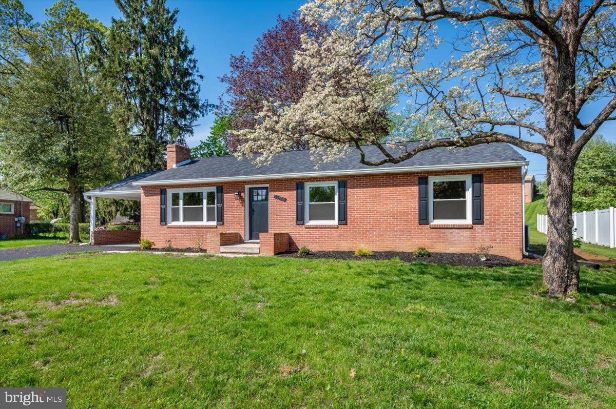 13616 Royal Road Hagerstown, MD 21742 - Photo 51 of 57 Charming brick home with lush greenery.