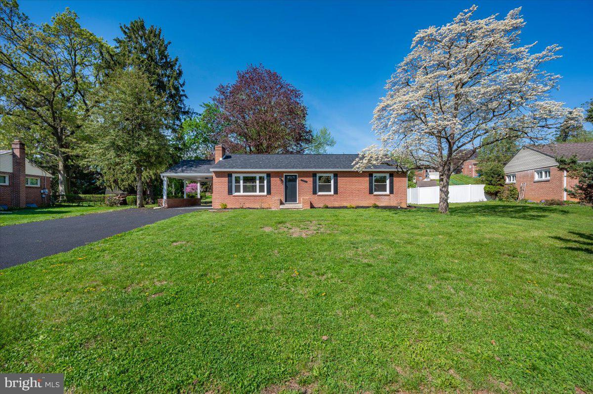13616 Royal Road Hagerstown, MD 21742 - Photo 52 of 57 Charming brick home with lush greenery.