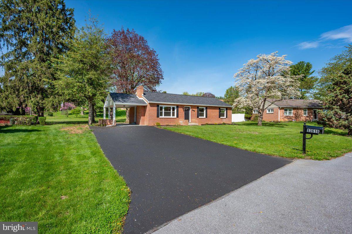 13616 Royal Road Hagerstown, MD 21742 - Photo 53 of 57 Charming brick home on lush green lawn.