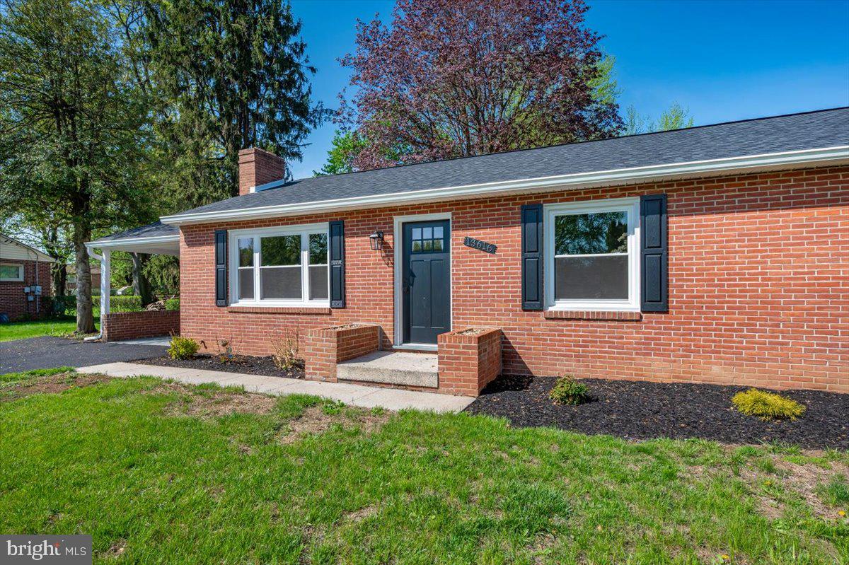 13616 Royal Road Hagerstown, MD 21742 - Photo 54 of 57 Charming brick home with lush greenery.