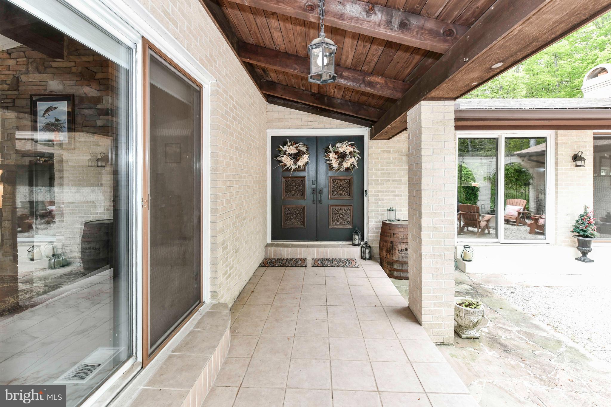 7833 Willowbrook Road Fairfax Station, VA 22039 - Photo 13 of 51 a view of a entryway door