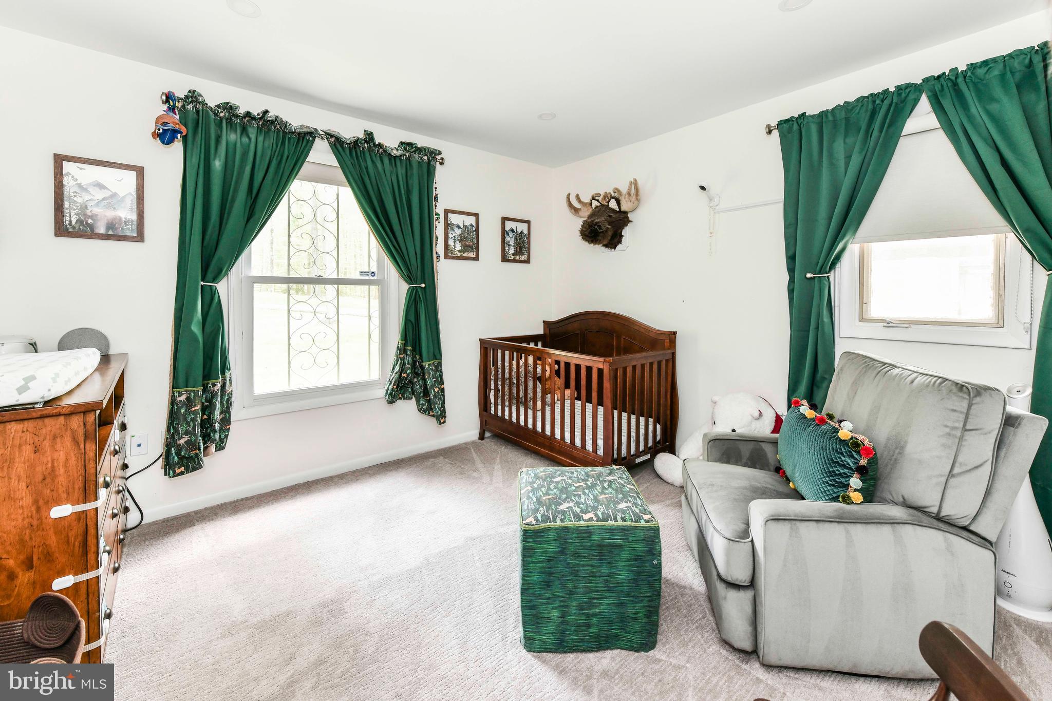 7833 Willowbrook Road Fairfax Station, VA 22039 - Photo 20 of 51 a living room with furniture and a window