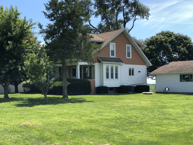1587 East 7th Road Lostant, IL 61334 - Photo 1 of 21 a front view of a house with a yard