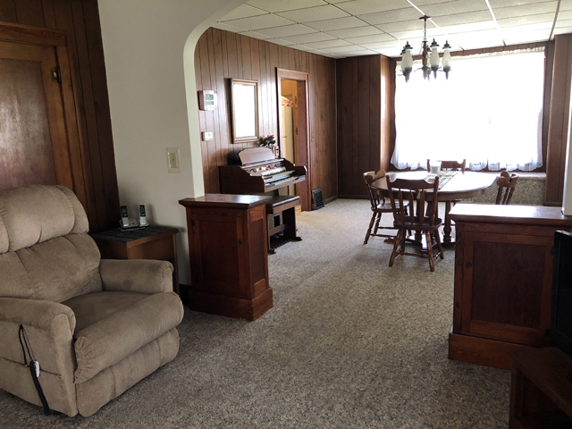 1587 East 7th Road Lostant, IL 61334 - Photo 6 of 21 a living room with furniture and a window