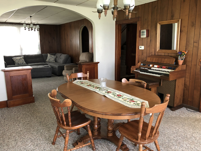 1587 East 7th Road Lostant, IL 61334 - Photo 8 of 21 a dining room with furniture and chandelier
