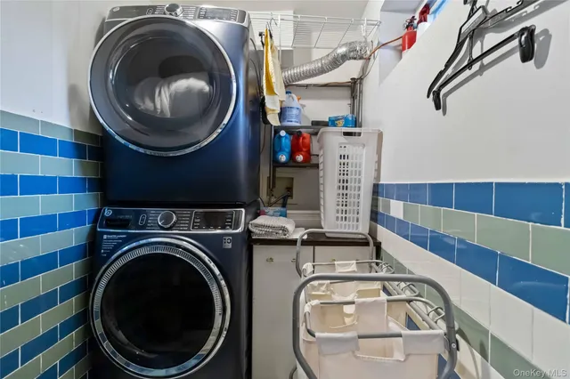 a utility room with dryer and washer
