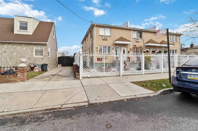 a front view of a building with street