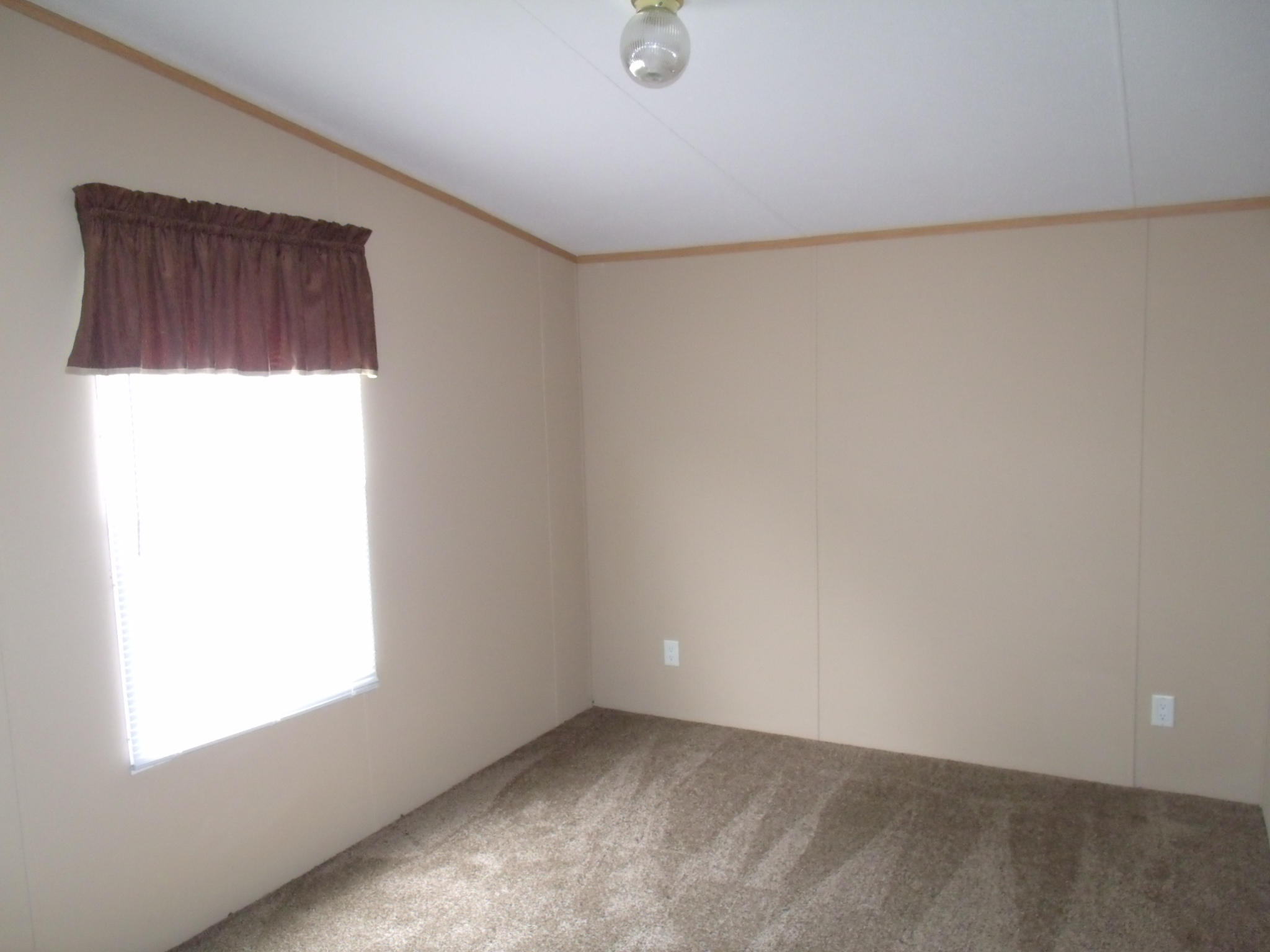 1008 Black Jack Road Stuart, VA 24171 - Photo 11 of 14 an empty room with a window