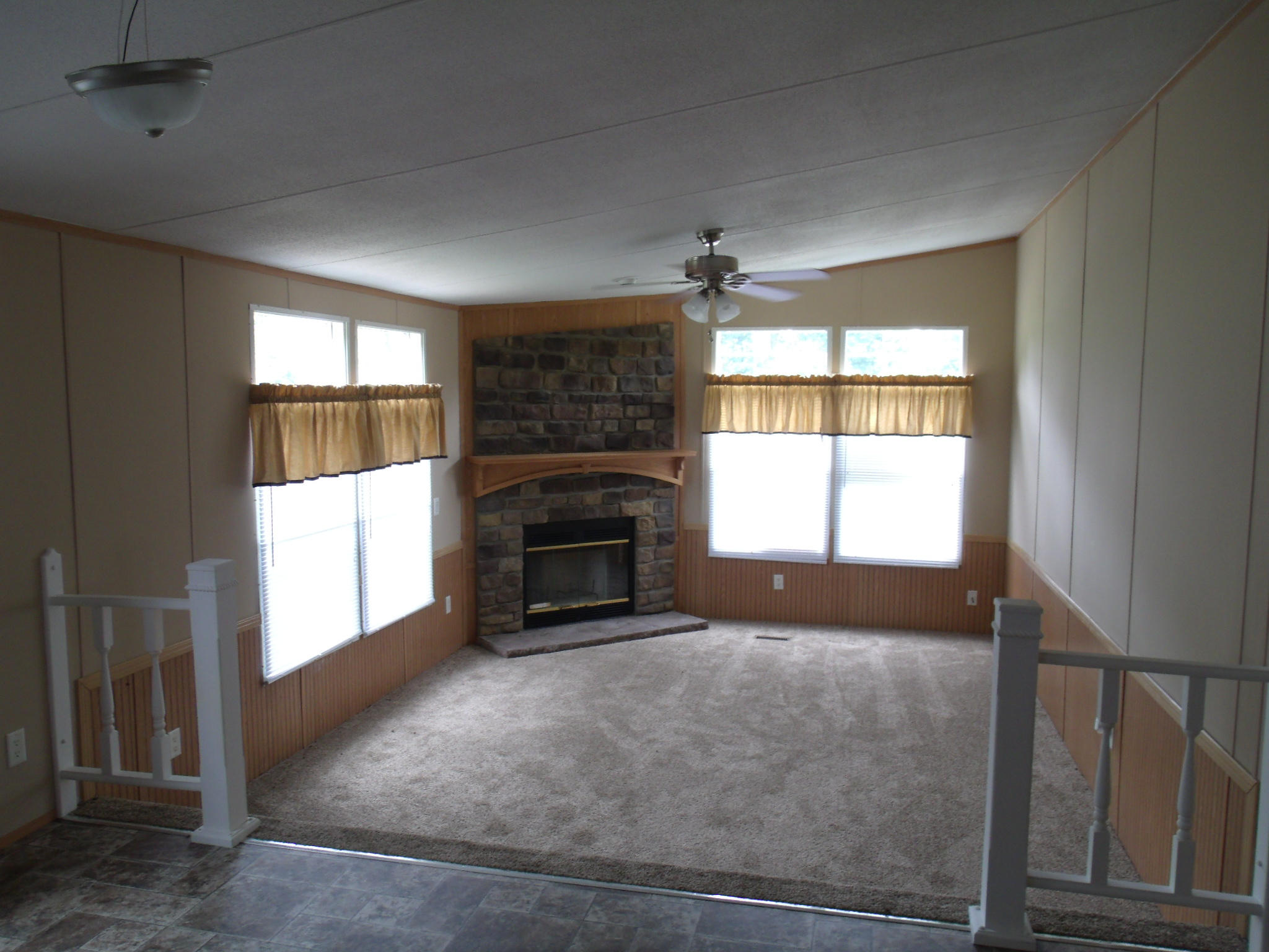 1008 Black Jack Road Stuart, VA 24171 - Photo 6 of 14 a view of empty room with a fireplace