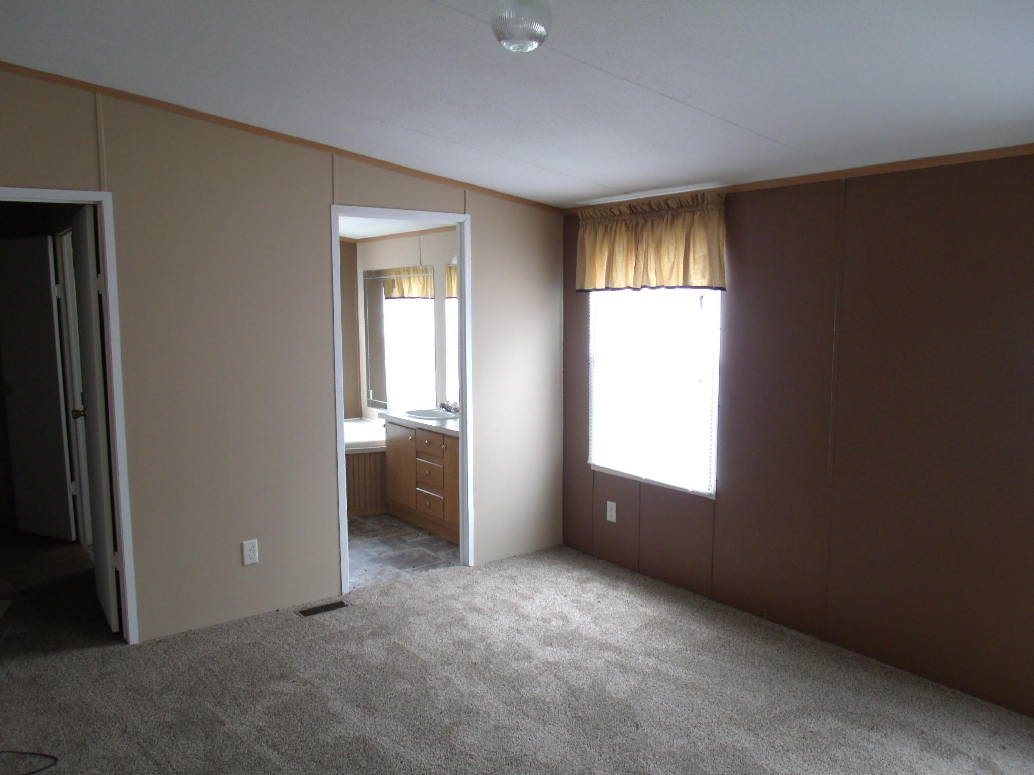 1008 Black Jack Road Stuart, VA 24171 - Photo 9 of 14 a view of an empty room with a window