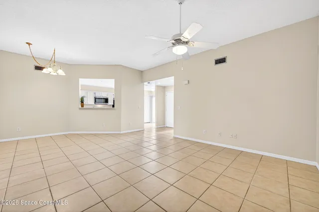 a view of an empty room and window