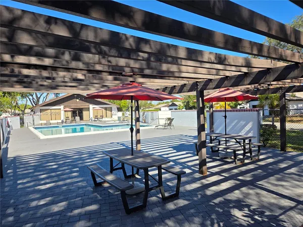 a patio with an outdoor seating