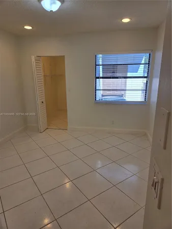 a view of a small space and a window