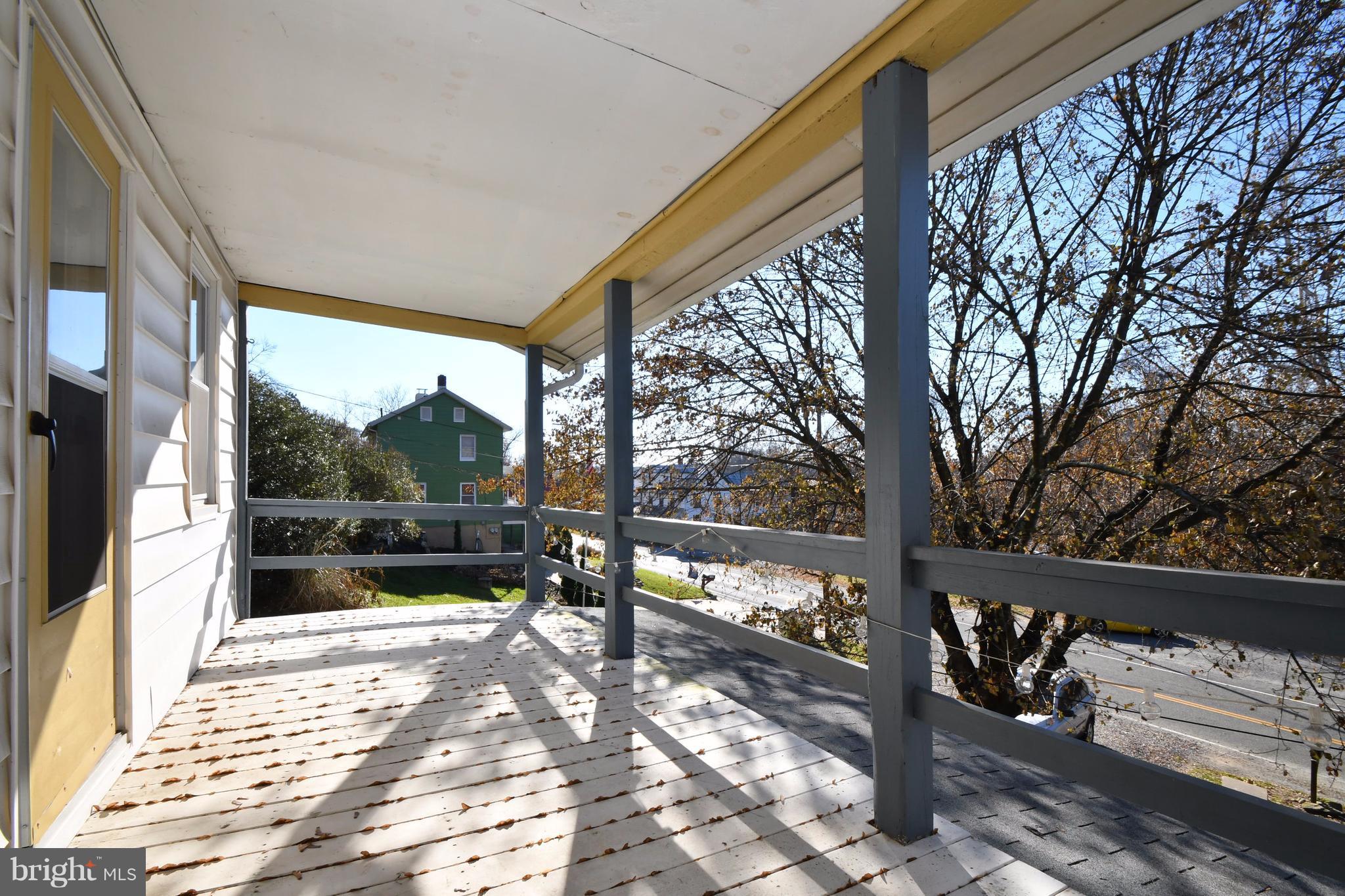 1095 Colora Road Colora, MD 21917 - Photo 23 of 29 a view of a bench in the porch