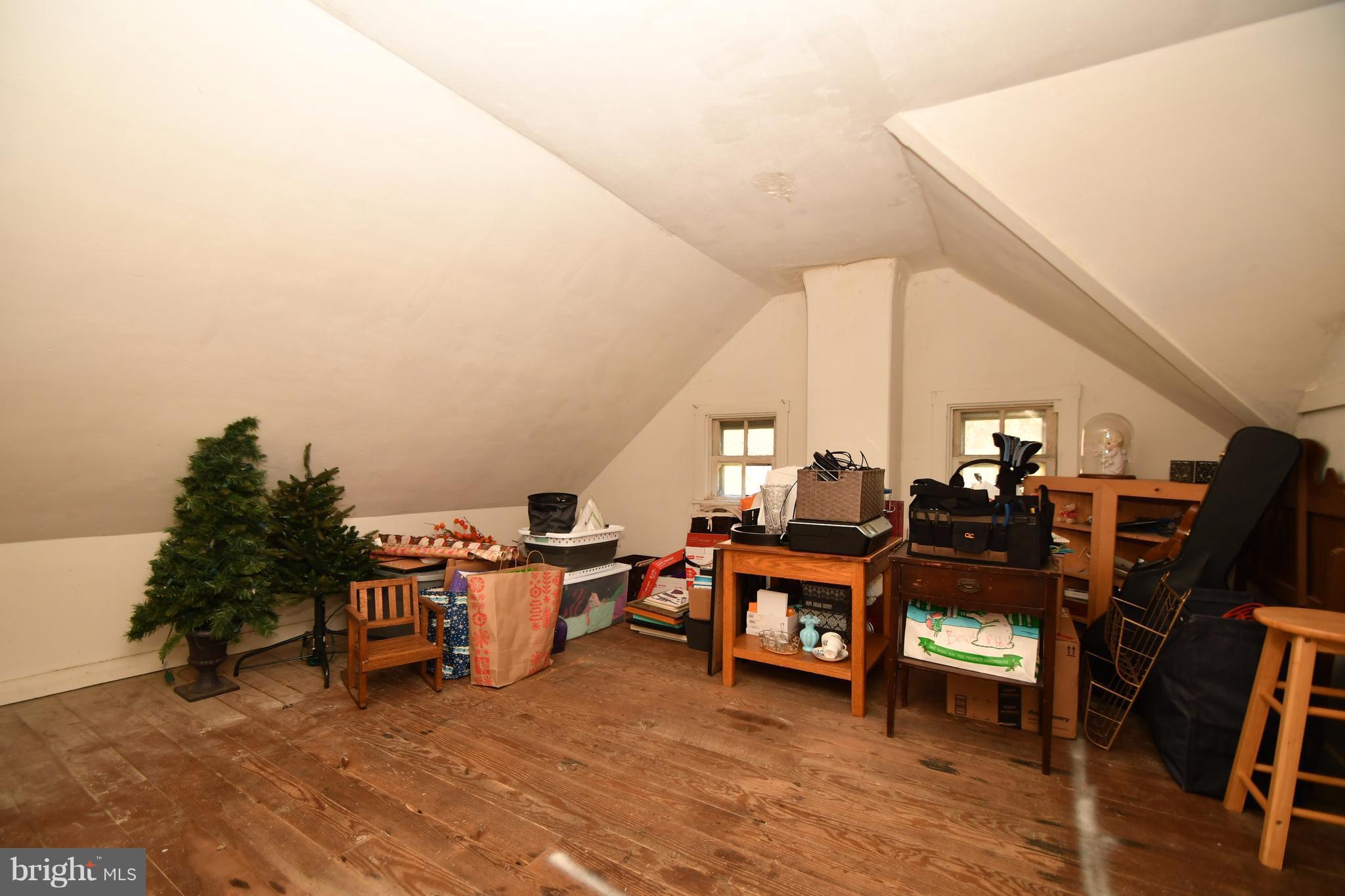 1095 Colora Road Colora, MD 21917 - Photo 24 of 29 a view of a big room with wooden floor and furniture