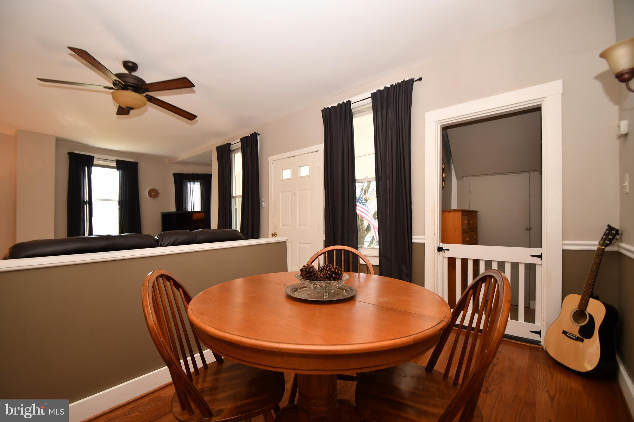 1095 Colora Road Colora, MD 21917 - Photo 9 of 29 a view of a dining room with furniture and wooden floor