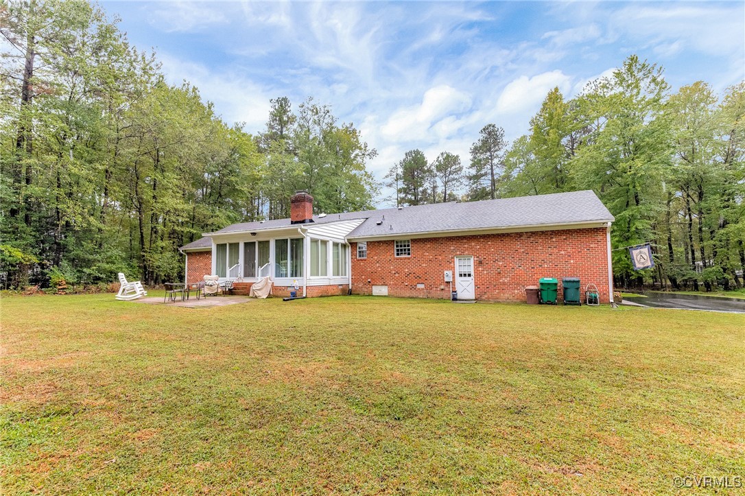 2530 Yarnell Road Henrico, VA 23231 - Photo 3 of 22 a front view of a house with a garden