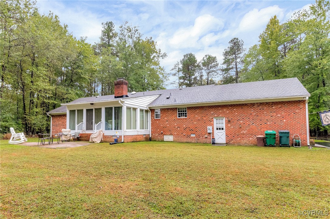 2530 Yarnell Road Henrico, VA 23231 - Photo 4 of 22 a front view of a house with a yard
