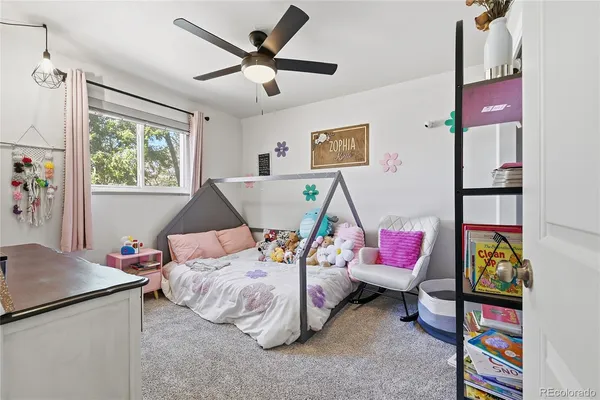 a bedroom with furniture and a bed