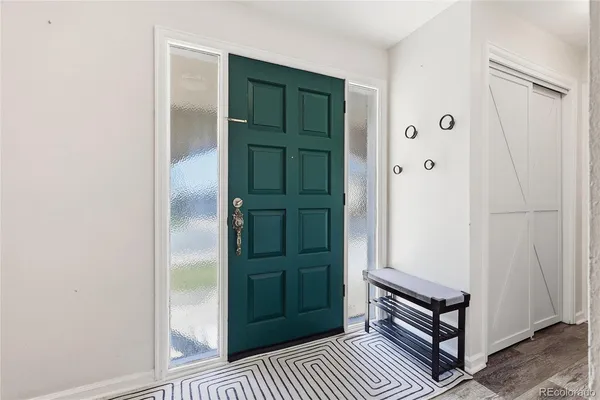 a view of a hallway with entryway