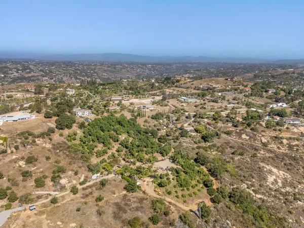 an aerial view of residential space with ocean view