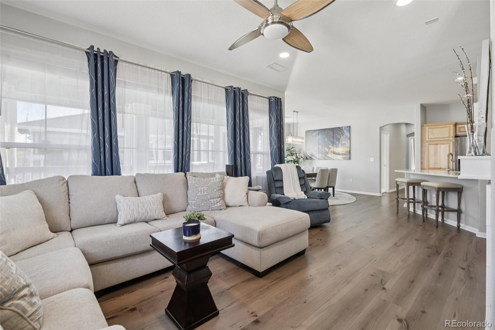 224 Whitehaven Circle Highlands Ranch, CO 80129 - Photo 2 of 34 a living room with furniture and a large window