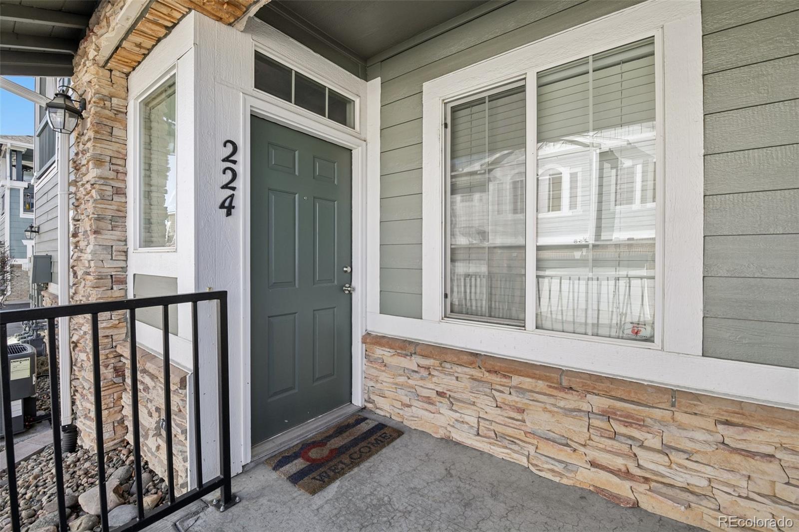224 Whitehaven Circle Highlands Ranch, CO 80129 - Photo 29 of 34 a view of front door of house