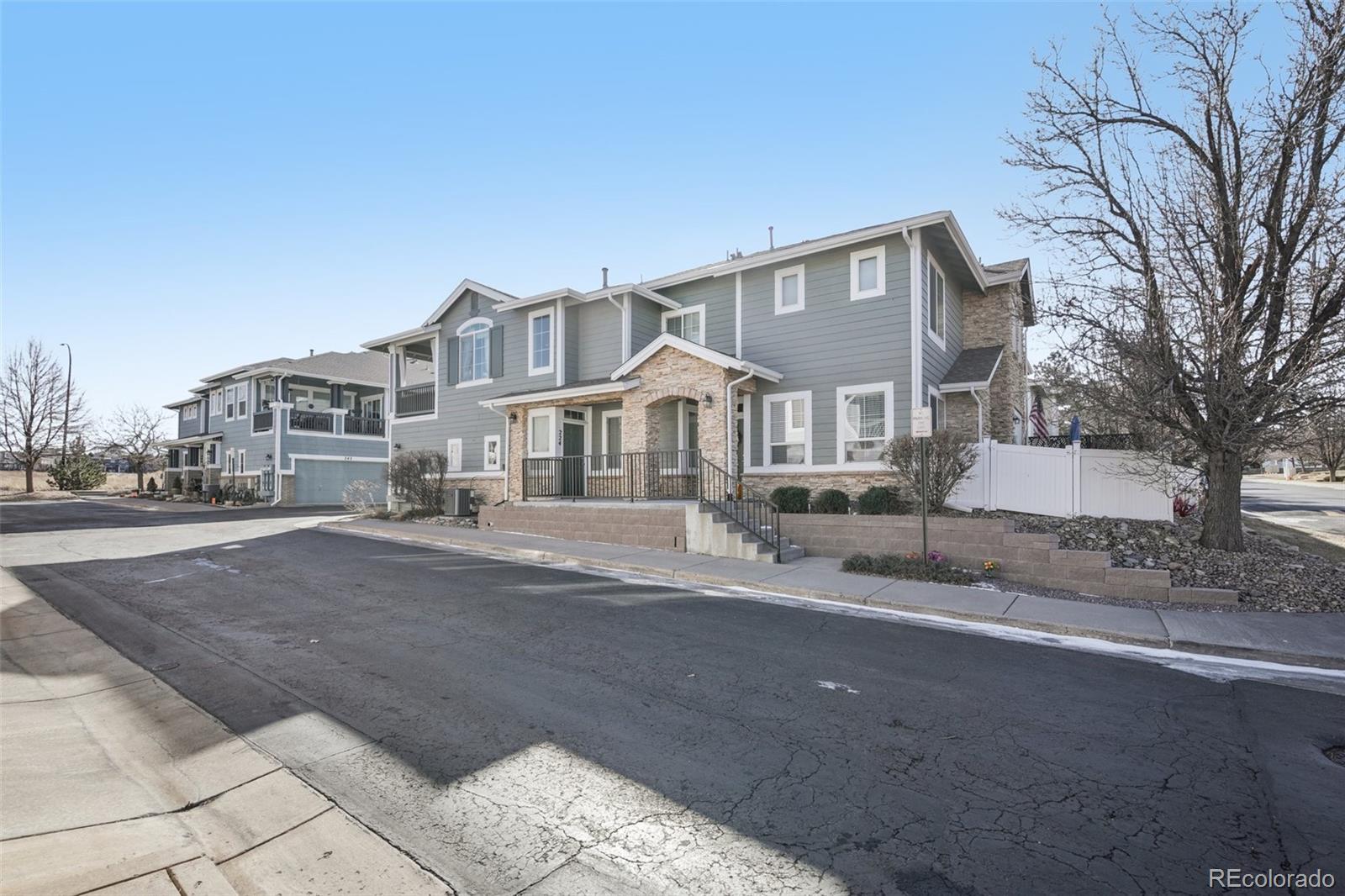 224 Whitehaven Circle Highlands Ranch, CO 80129 - Photo 30 of 34 a city view with tall buildings and a street