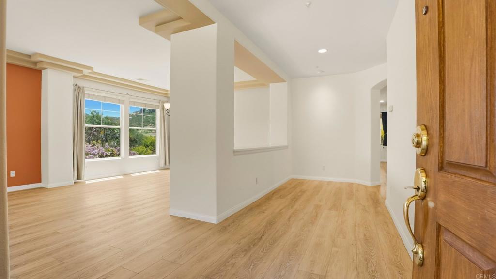 2527 Southern Oak Road Ramona, CA 92065 - Photo 13 of 56 a view of a room with wooden floor and a window