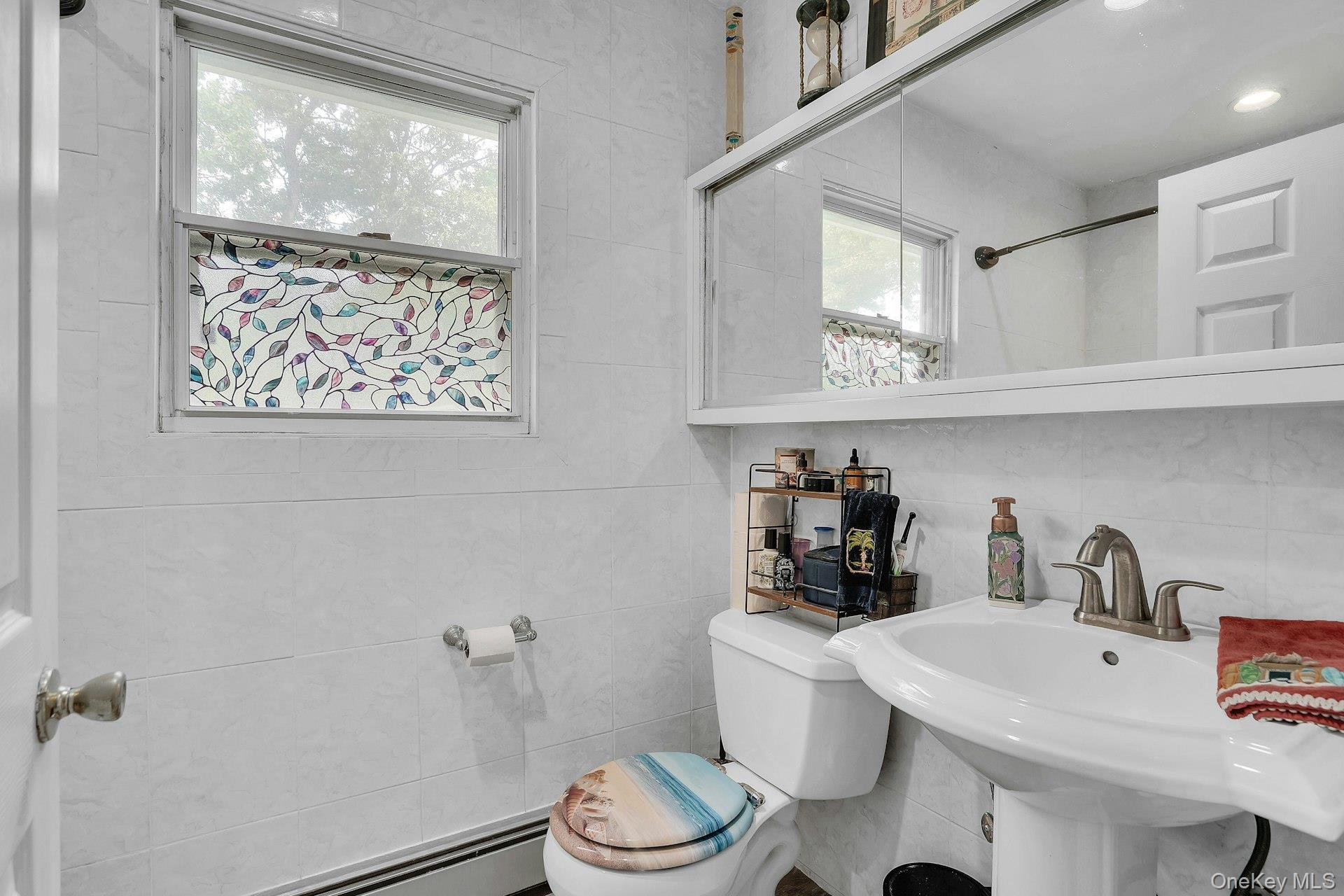 79 Wicks Road Commack, NY 11725 - Photo 13 of 34 Full Bathroom First Floor.