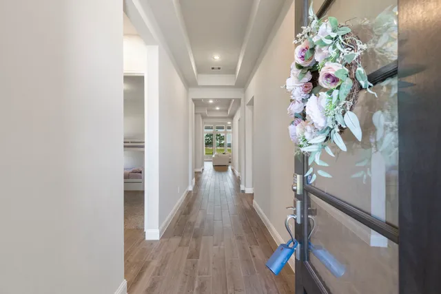 a view of entryway with wooden floor