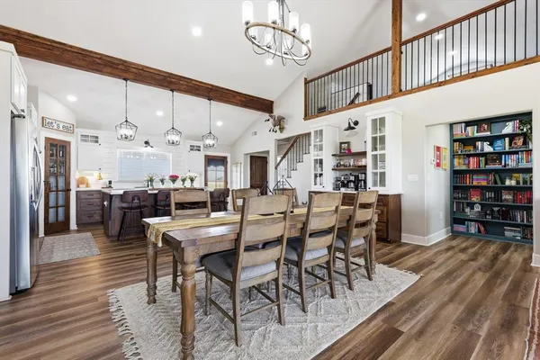 a view of a dining room with furniture