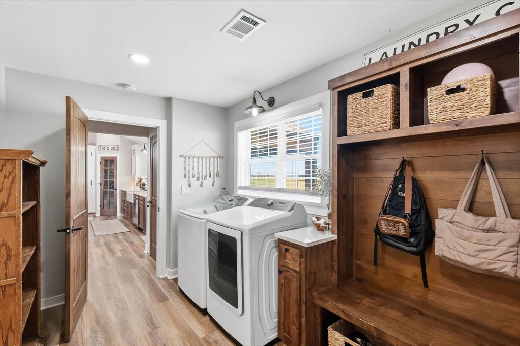 2201 South Road Whitesboro, TX 76273 - Photo 27 of 40 a view of a kitchen area with furniture and wooden floor