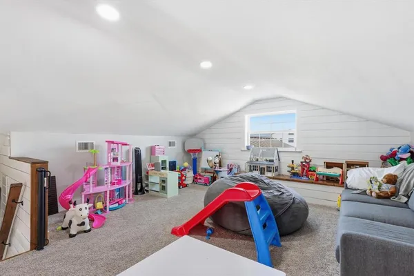 a living room with lots of furniture