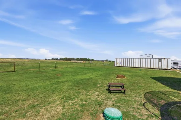 a view of a golf course with a garden