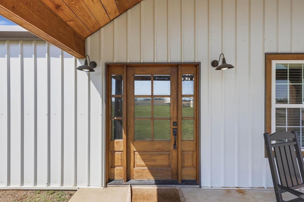 2201 South Road Whitesboro, TX 76273 - Photo 4 of 40 a view of a entryway door of the house