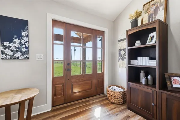 a view of workspace with wooden floor