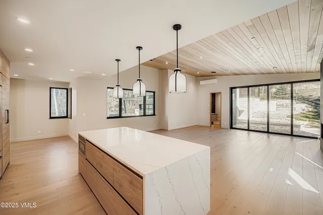 a bench sitting in a kitchen