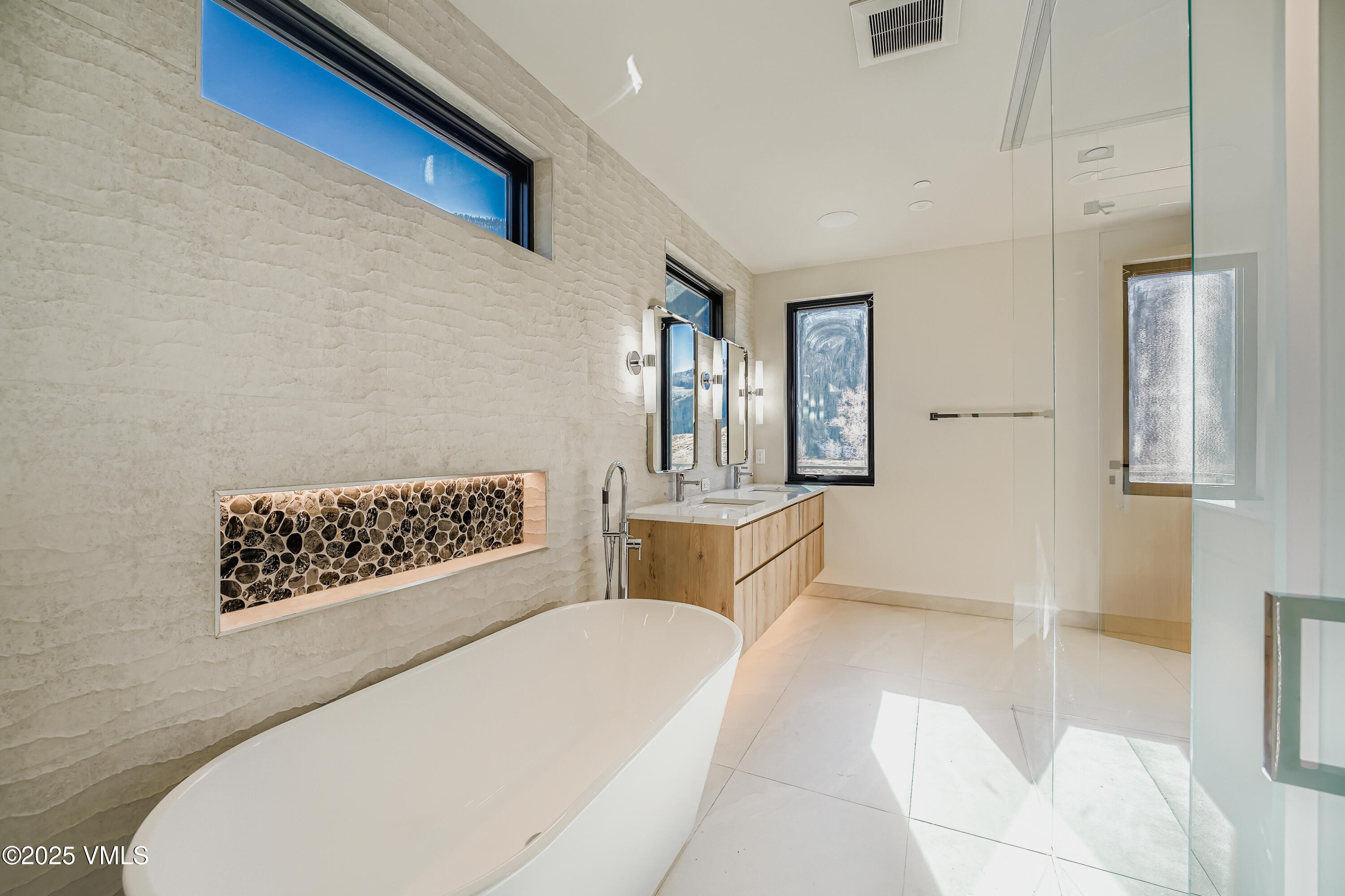 2811 Bald Mountain Road Vail, CO 81657 - Photo 25 of 55 a living room with a couch and a dresser with rug