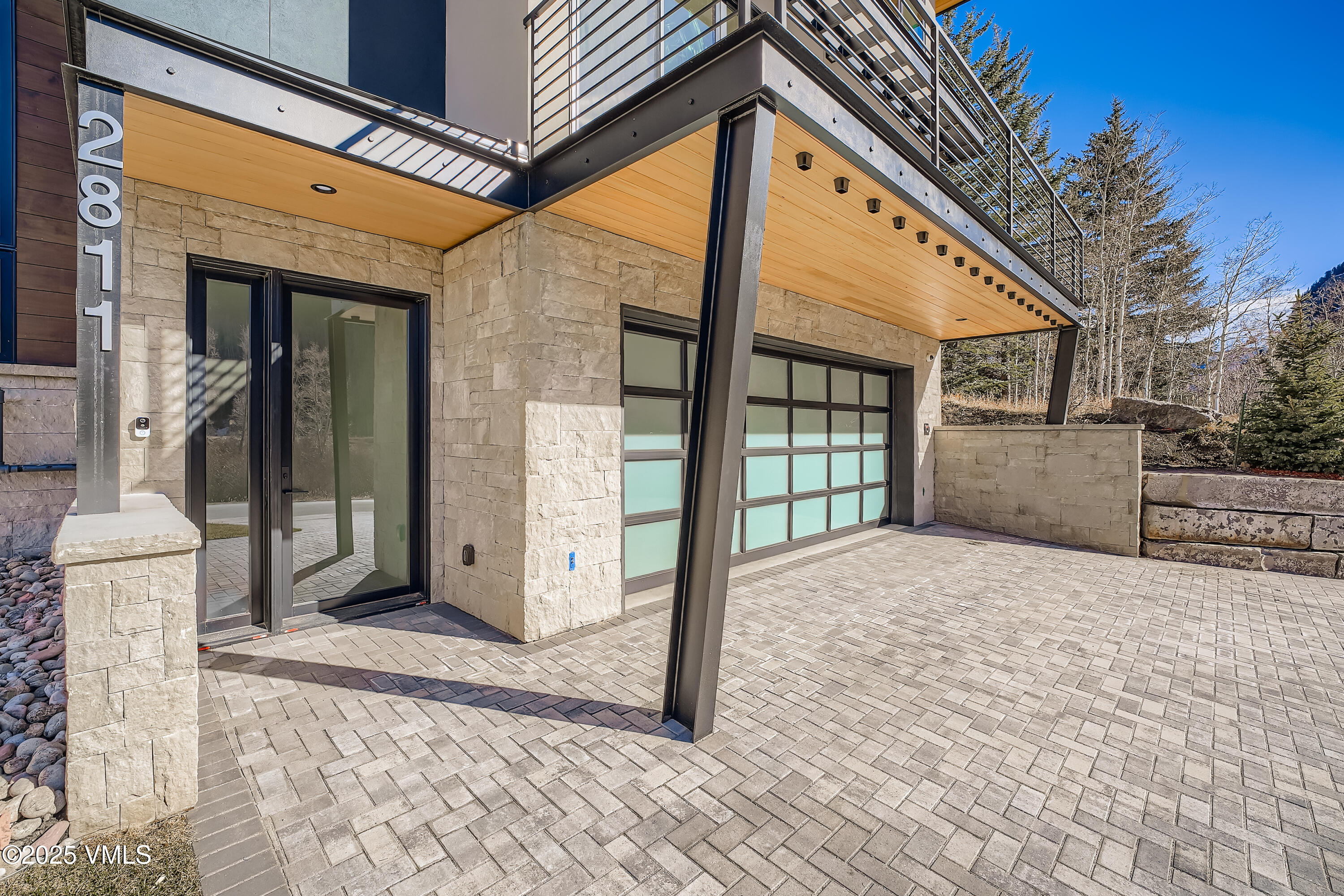 2811 Bald Mountain Road Vail, CO 81657 - Photo 4 of 55 a porch with seating space